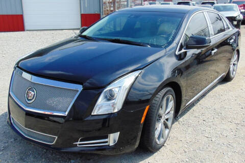 2013 Cadillac XTS for sale at Kenny's Auto Wrecking - FLOOD CARS in Lima OH