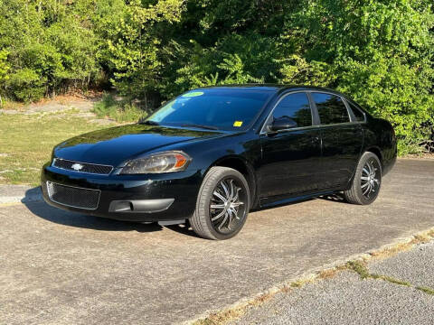 2013 Chevrolet Impala for sale at A & A Auto Sales in Fayetteville AR