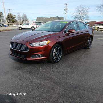 2016 Ford Fusion for sale at Ideal Auto Sales, Inc. in Waukesha WI