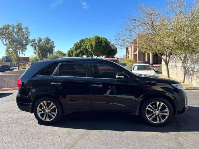 2014 Kia Sorento for sale at HUDSONS AUTOS in Gilbert, AZ