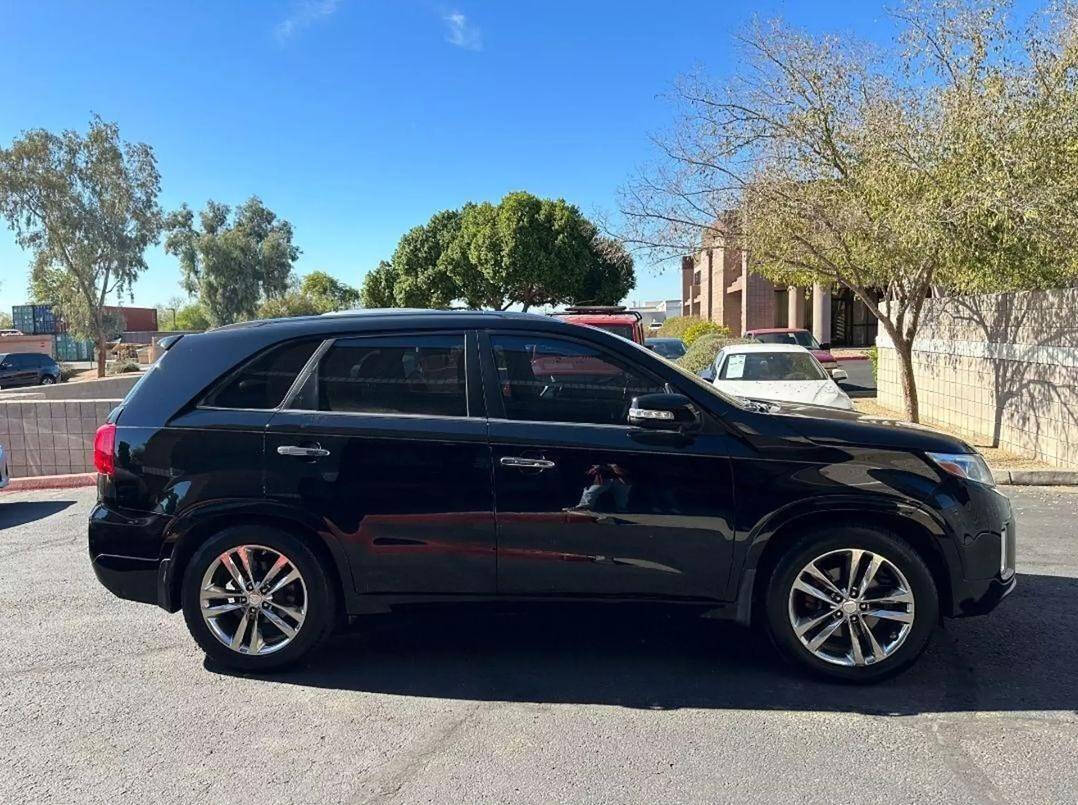 2014 Kia Sorento for sale at HUDSONS AUTOS in Gilbert, AZ