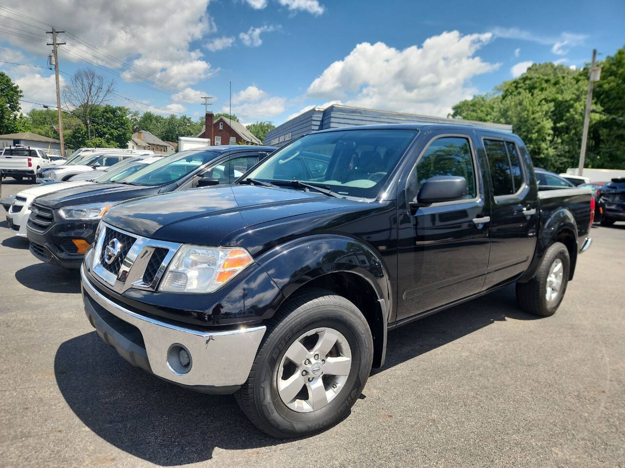 Black 2010 Nissan Frontier LE 4x4 LE 4dr Crew Cab SWB Pickup 5A 2