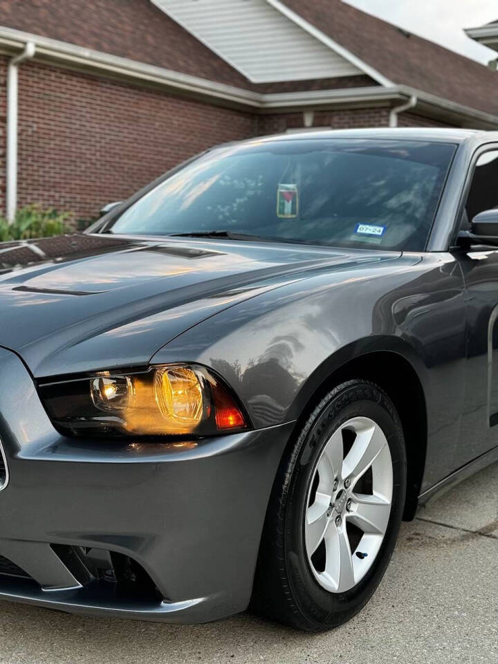 2014 Dodge Charger for sale at Akl Motor LLC in Vance, AL