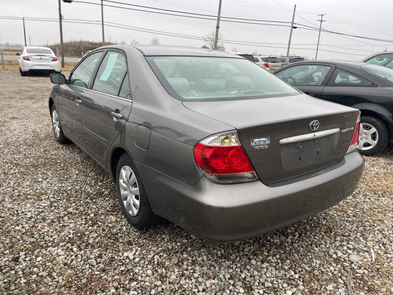 2005 Toyota Camry for sale at HEDGES USED CARS in Carleton MI