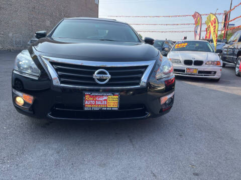 2014 Nissan Altima for sale at RON'S AUTO SALES INC in Cicero IL