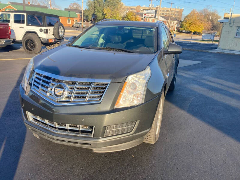 2014 Cadillac SRX for sale at RABIDEAU'S AUTO MART in Green Bay WI