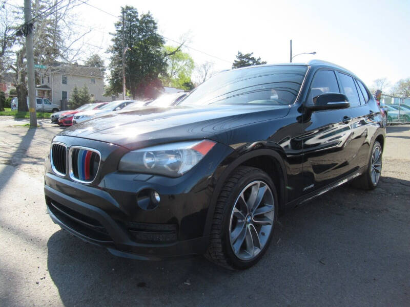 2015 BMW X1 for sale at CARS FOR LESS OUTLET in Morrisville PA