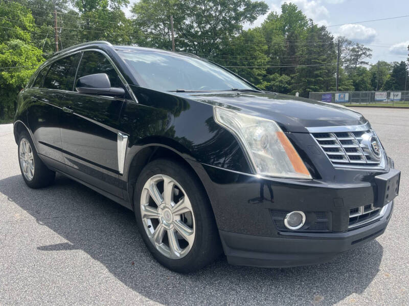 Used 2014 Cadillac SRX Performance Collection with VIN 3GYFNCE3XES662436 for sale in Roswell, GA