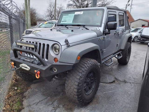 2013 Jeep Wrangler Unlimited for sale at WOOD MOTOR COMPANY in Madison TN