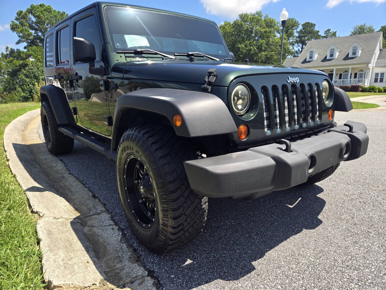 2010 Jeep Wrangler Unlimited for sale at Connected Auto Group in Macon, GA