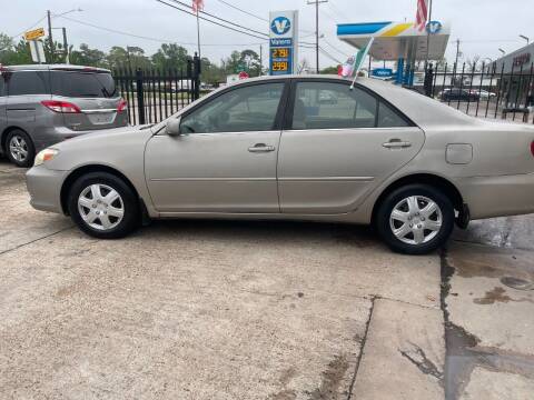 2002 Toyota Camry for sale at Under Priced Auto Sales in Houston TX