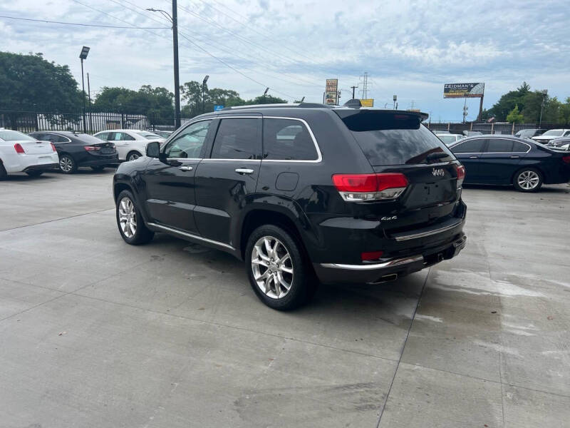 Used 2015 Jeep Grand Cherokee Summit with VIN 1C4RJFJG2FC718529 for sale in Detroit, MI