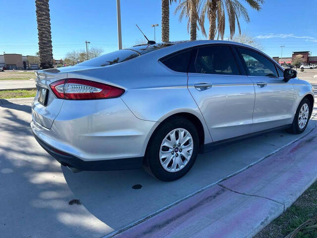 2014 Ford Fusion for sale at Kingdom Auto in Phoenix, AZ