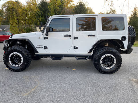 2015 Jeep Wrangler Unlimited for sale at R & R Motors in Queensbury NY