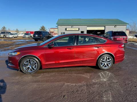 2014 Ford Fusion for sale at Car Guys Autos in Tea SD