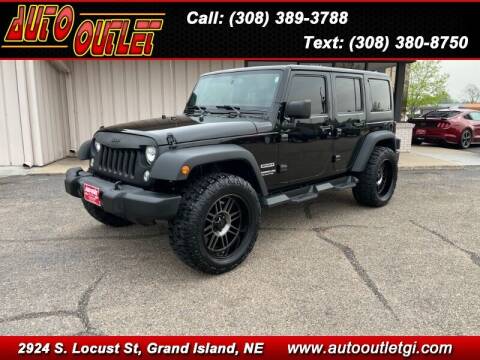 2016 Jeep Wrangler Unlimited for sale at Auto Outlet in Grand Island NE