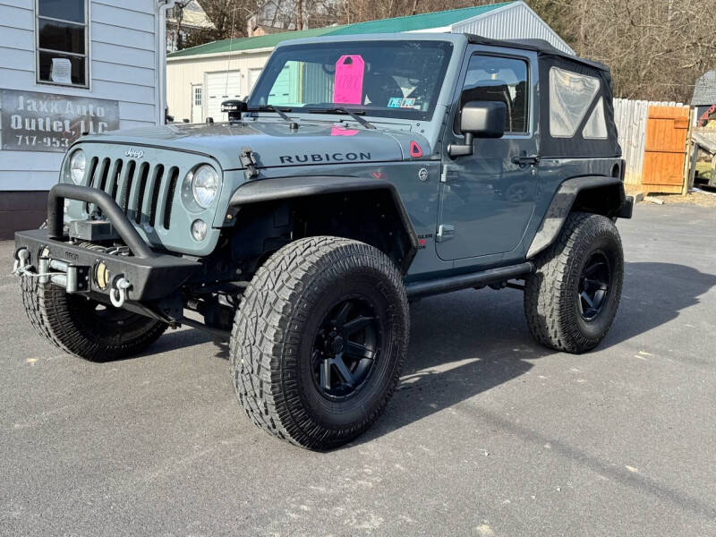 2014 Jeep Wrangler for sale at Jaxx Auto Outlet in Yeagertown PA