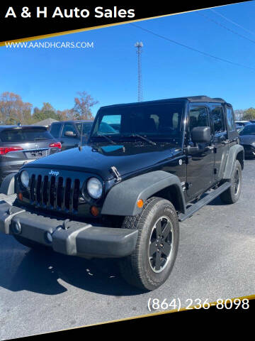 2013 Jeep Wrangler Unlimited for sale at A & H Auto Sales in Greenville SC