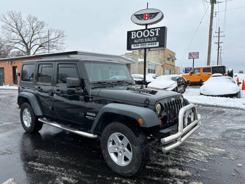 2012 Jeep Wrangler Unlimited for sale at BOOST AUTO SALES in Saint Louis MO