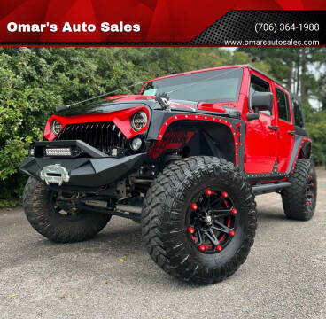 2015 Jeep Wrangler Unlimited for sale at Omar's Auto Sales in Martinez GA