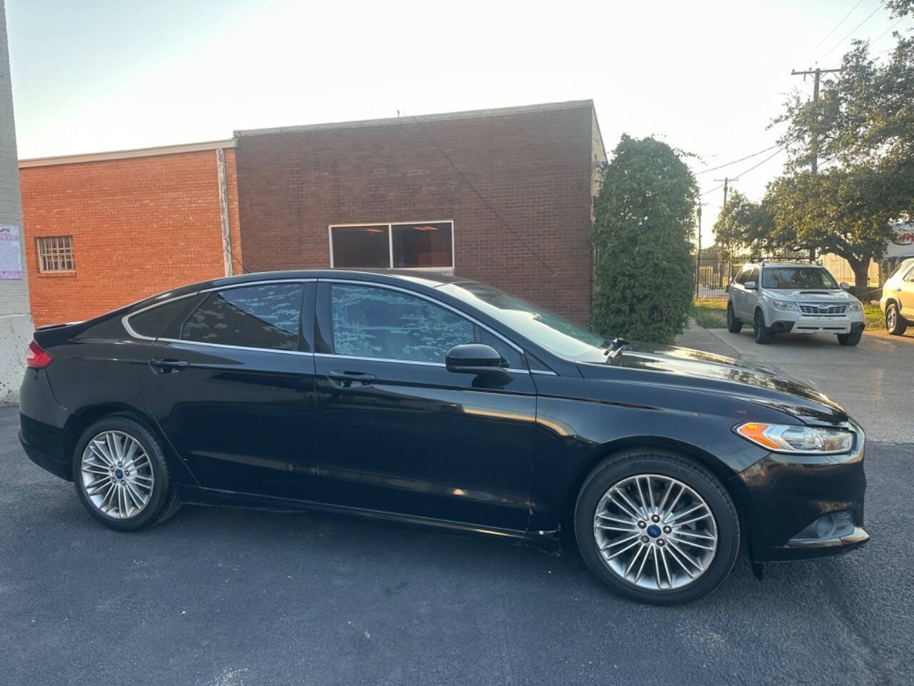 2016 Ford Fusion for sale at Sarenco Auto Inc in Dallas, TX