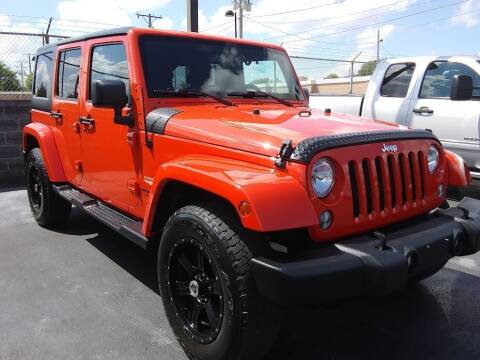 2015 Jeep Wrangler Unlimited for sale at Village Auto Outlet in Milan IL