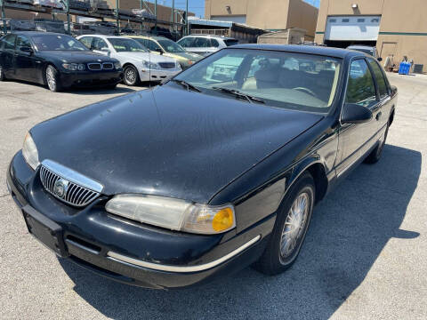 1997 Mercury Cougar for sale at REDA AUTO PORT INC in Villa Park IL