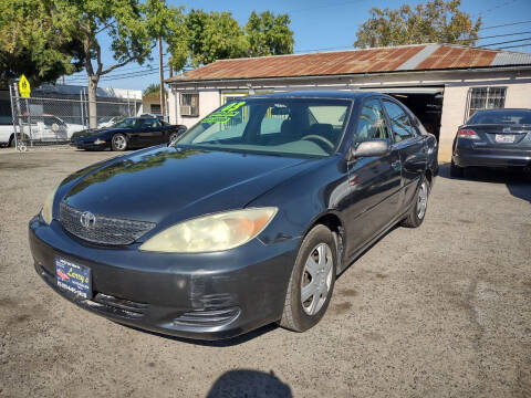 2003 Toyota Camry for sale at Larry's Auto Sales Inc. in Fresno CA