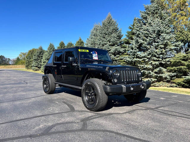 2016 Jeep Wrangler Unlimited for sale at KAYES TRUCKS AND PARTS LLC in West Bend, WI