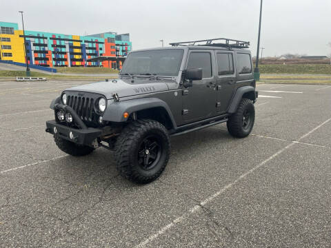 2014 Jeep Wrangler Unlimited for sale at D Majestic Auto Group Inc in Ozone Park NY