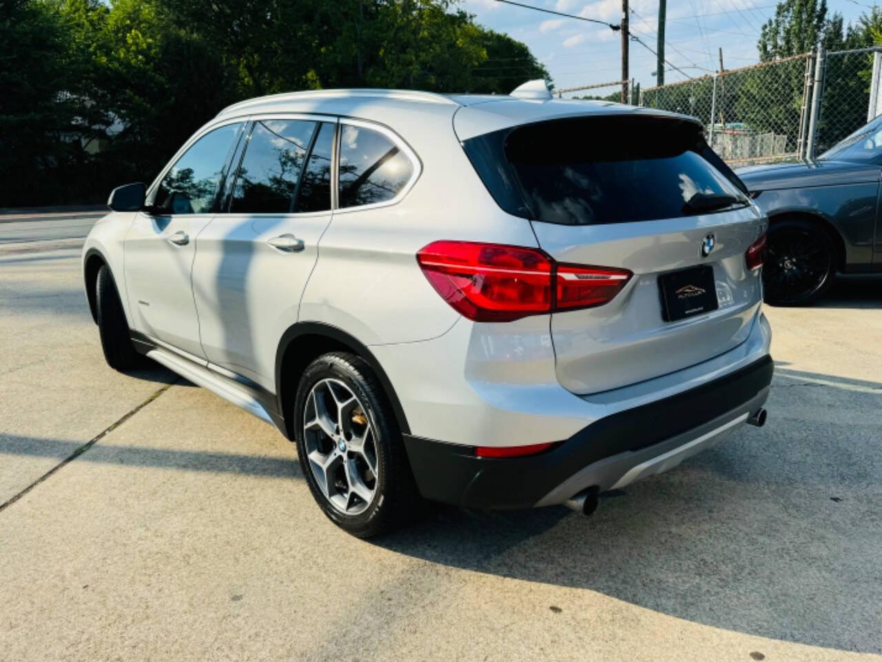 2016 BMW X1 for sale at AUTO LUX INC in Marietta, GA