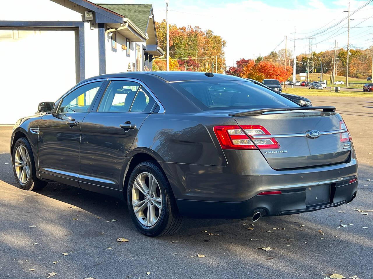 2015 Ford Taurus for sale at Spartan Elite Auto Group LLC in Lansing, MI