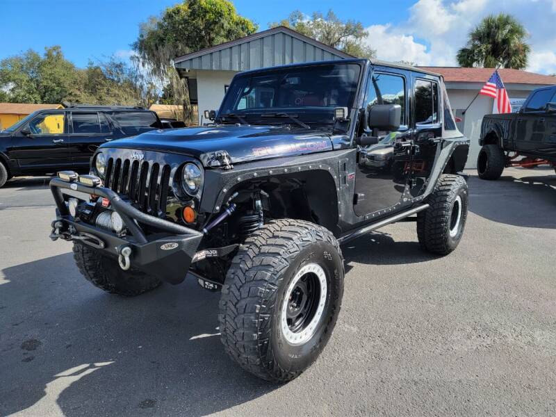 2013 Jeep Wrangler Unlimited for sale at Lake Helen Auto in Orange City FL