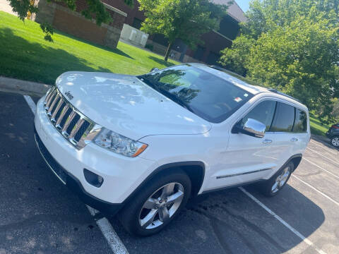 2011 Jeep Grand Cherokee for sale at United Motors in Saint Cloud MN