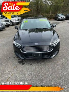 2016 Ford Fusion Hybrid for sale at Select Luxury Motors in Cumming GA