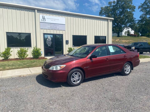 2004 Toyota Camry for sale at B & B AUTO SALES INC in Odenville AL