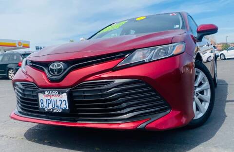 2019 Toyota Camry for sale at Lugo Auto Group in Sacramento CA