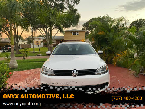 2011 Volkswagen Jetta for sale at ONYX AUTOMOTIVE, LLC in Largo FL