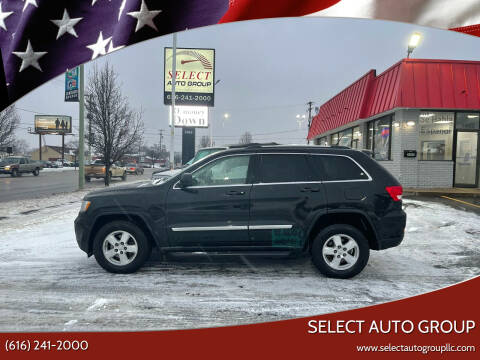 2012 Jeep Grand Cherokee for sale at Select Auto Group in Wyoming MI
