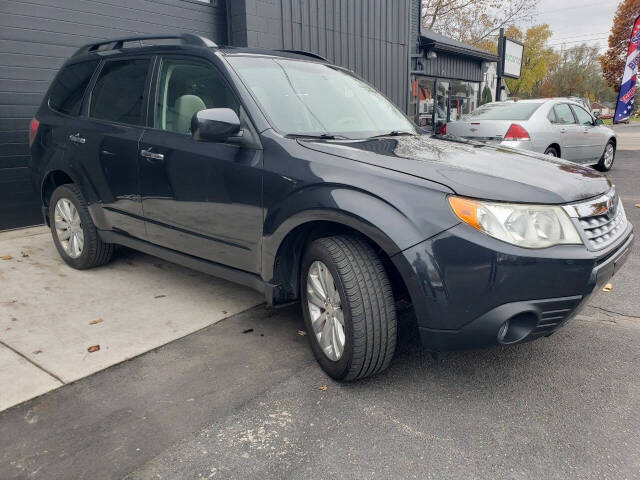 2011 Subaru Forester for sale at Auto Shop in Wyoming, MI