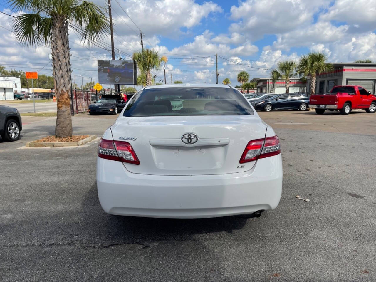 2011 Toyota Camry for sale at SMART CHOICE AUTO in Pasadena, TX