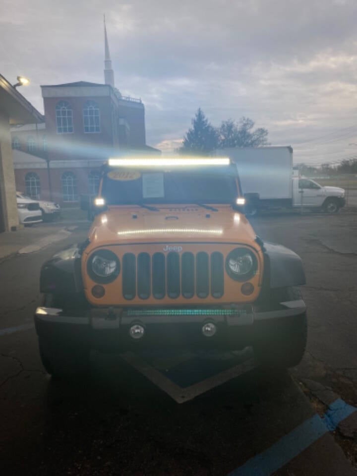 2012 Jeep Wrangler Unlimited for sale at Post Rd Motors in Indianapolis, IN