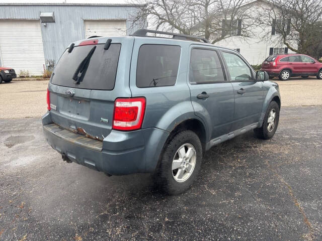 2010 Ford Escape for sale at DECKER AUTO SALES in Bay City, MI