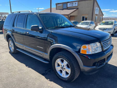 2004 Ford Explorer for sale at BERKENKOTTER MOTORS in Brighton CO