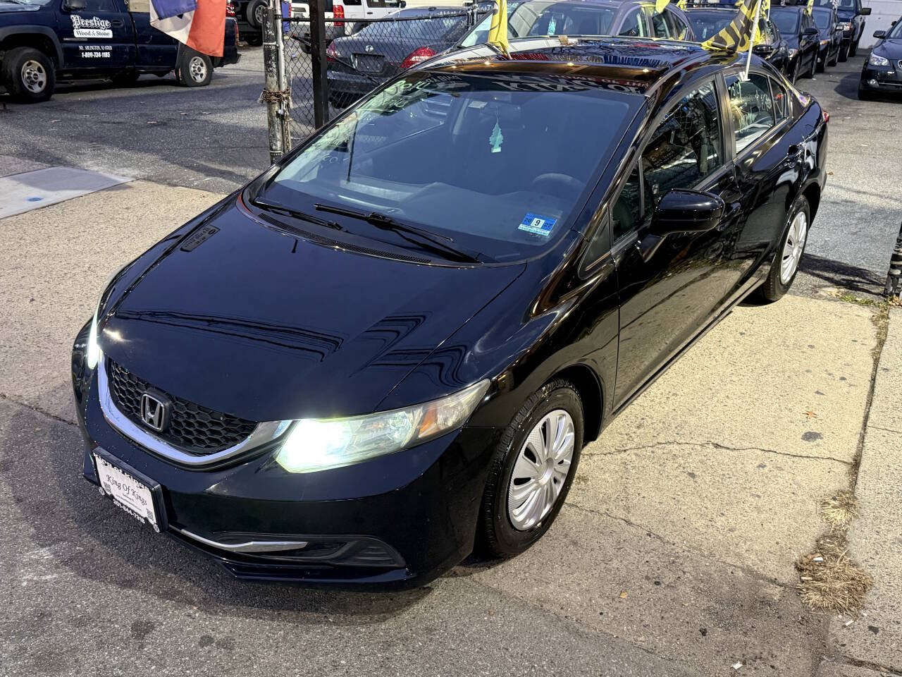 2014 Honda Civic LX 4dr Sedan CVT - Black exterior view 12