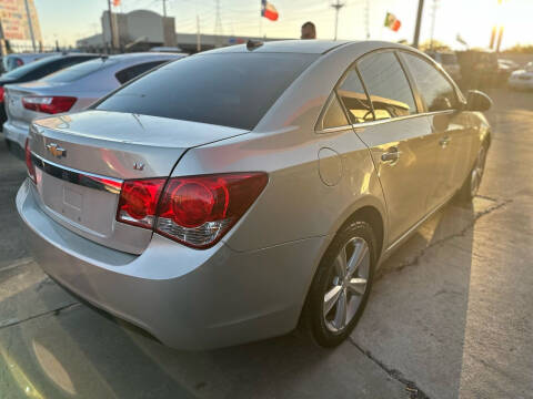 2013 Chevrolet Cruze for sale at Buy-Fast Autos in Houston TX