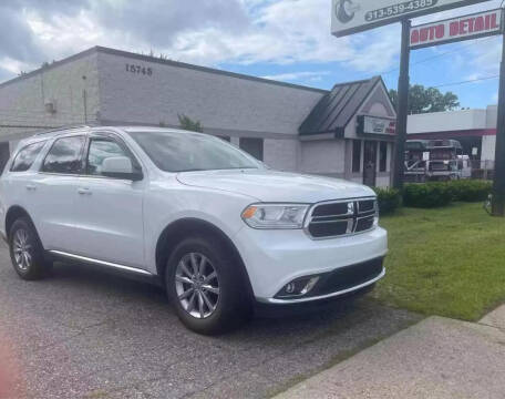 2016 Dodge Durango for sale at The Family Auto Finance in Redford MI