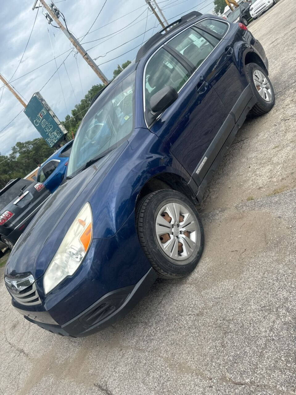 2011 Subaru Outback for sale at Calderon Auto Sales in Des Moines, IA