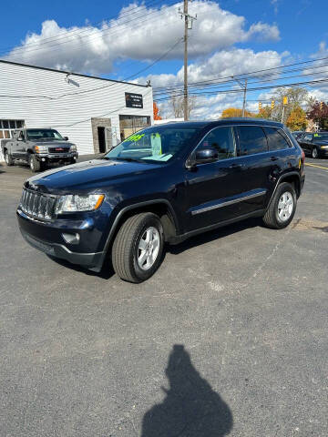 2011 Jeep Grand Cherokee for sale at Yono Brokerage Services, INC in Farmington MI