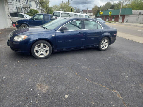 2010 Chevrolet Malibu for sale at Maximum Auto Group II INC in Cortland OH